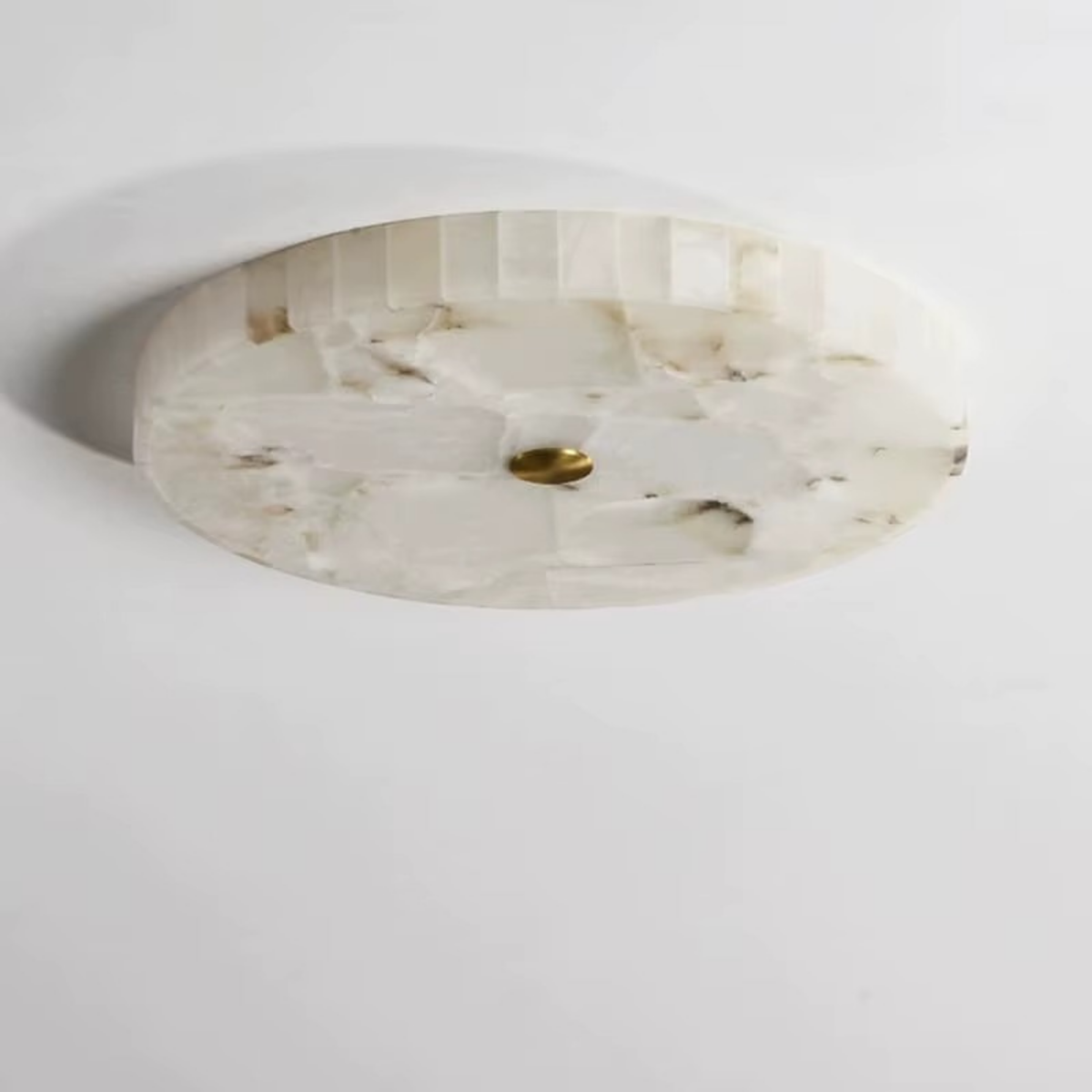 Round alabaster flush ceiling light with brass centre fitting - natural stone texture - Litora
