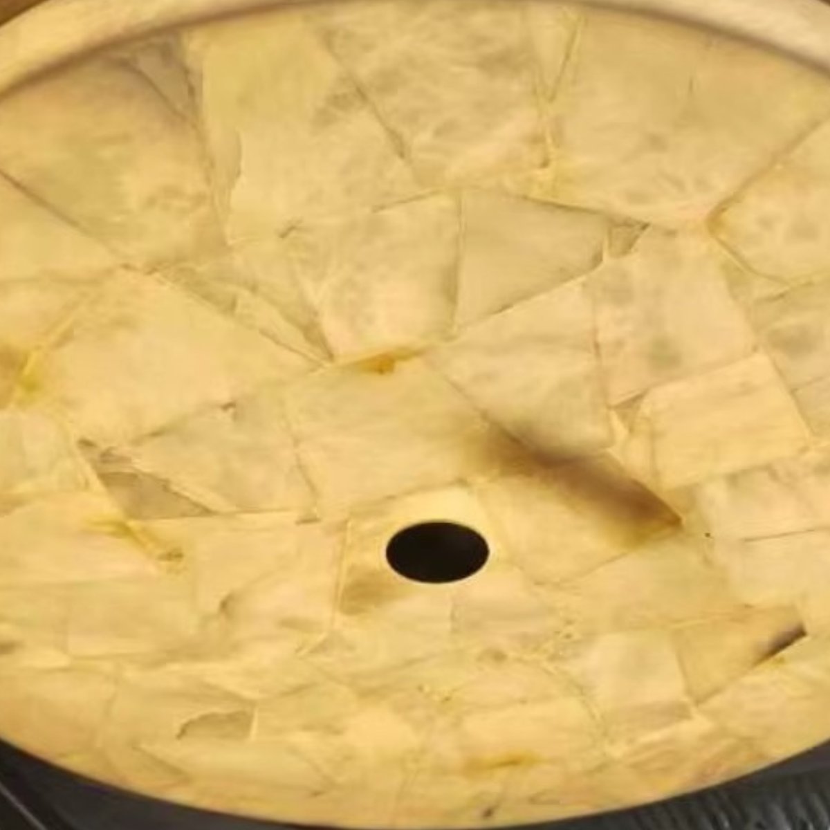 Round alabaster flush ceiling light top view - natural stone mosaic texture with brass fixing - Litora