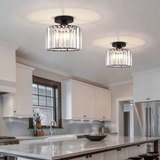 Two crystal drum semi-flush ceiling lights with vertical bar shades installed in a bright white kitchen - modern crystal ceiling lights - Litora