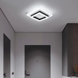 Double square LED flush ceiling light casting a bright halo effect in a dark modern hallway - minimalist LED ceiling light - Litora