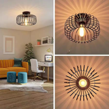 Round wire cage ceiling light casting dramatic radial shadow patterns on ceiling in living room, side view and top-down detail - decorative ceiling light effect - Litora