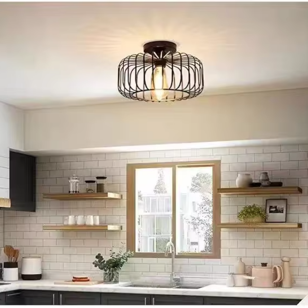 Black round wire cage flush ceiling light above a white subway tile kitchen with open shelving - industrial kitchen ceiling light - Litora